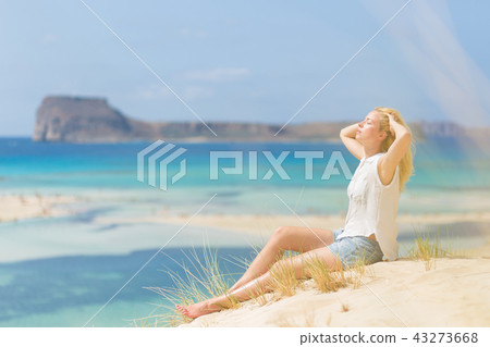 Relaxed Happy Woman Enjoying Sun on Vacations. Relaxed Happy Woman Enjoying Sun on Vacations. 43273668
