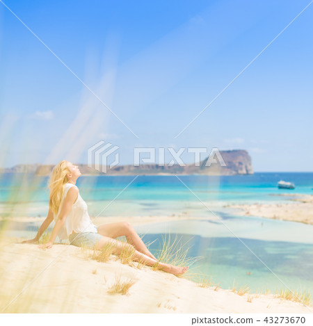 Relaxed Happy Woman Enjoying Sun on Vacations. 43273670