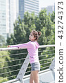 Sporty woman exercising concept 43274373