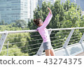 Sporty woman exercising concept 43274375