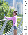 Sporty woman exercising concept 43274378