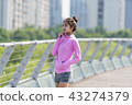 Sporty woman exercising concept 43274379