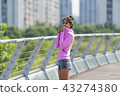 Sporty woman exercising concept 43274380