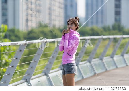Sporty woman exercising concept 43274380
