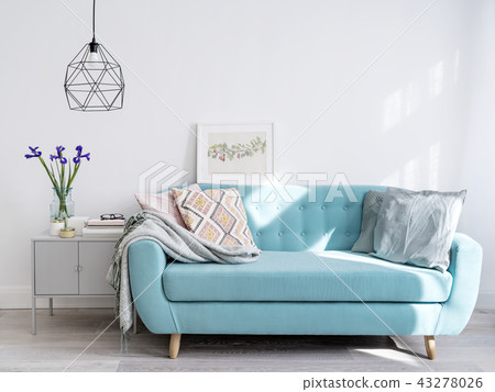Bright blue sofa in stylish home interior Bright blue sofa in stylish home interior 43278026