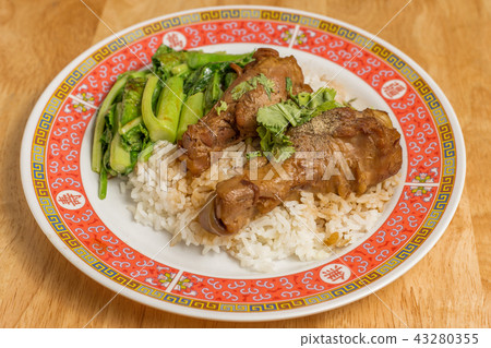 Stewed chicken with Chinese kale and rice. Stewed chicken with Chinese kale and rice. 43280355