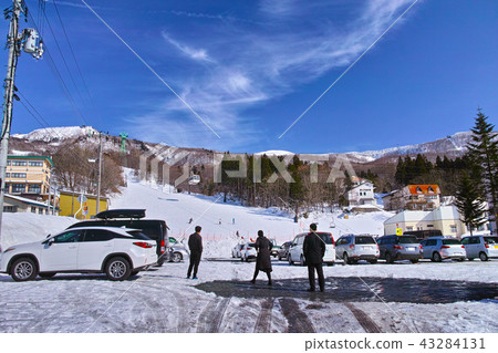 Landscape of Zao Central ropeway hot spring station parking lot in winter 43284131