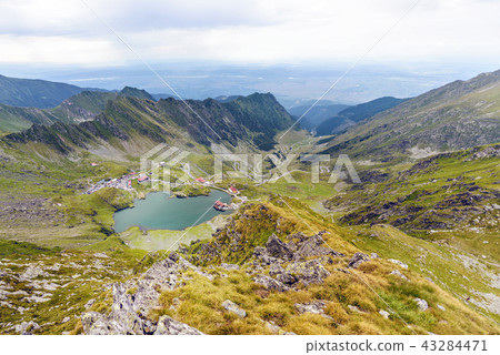 Scenery of Balea Lake and serpentine road 43284471