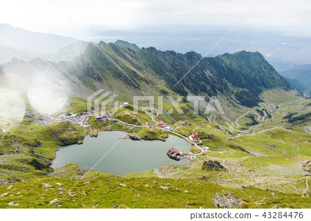 Scenery of Balea Lake and serpentine road 43284476