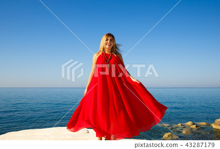 Woman in red 43287179