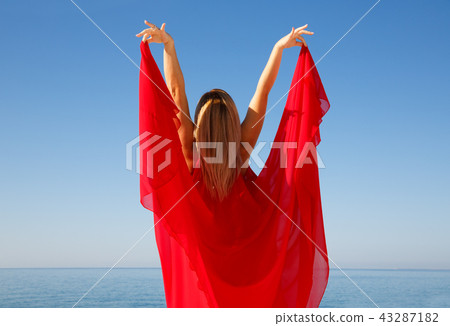Woman in red 43287182