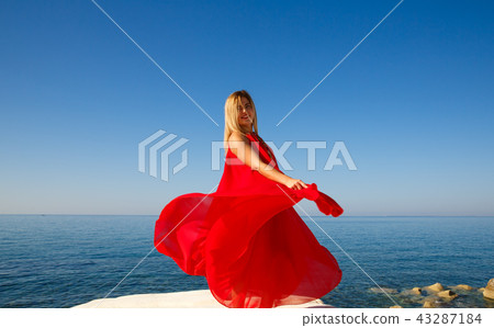 Woman in red 43287184