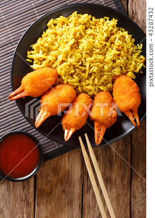 Fried crab claws tempura with rice close-up 43287432