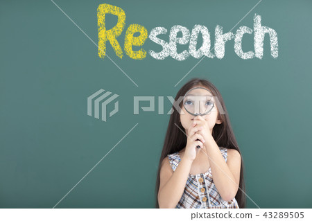 girl holding Magnifying with research concept girl holding Magnifying with research concept 43289505