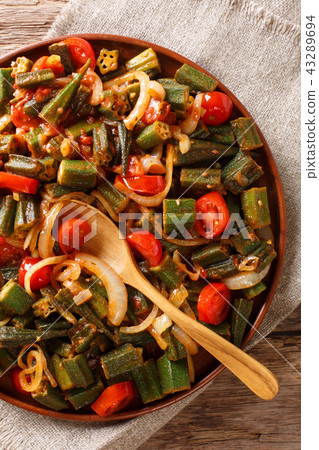 Healthy dietary meal okra with tomatoes and onion 43289694