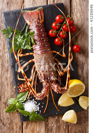 Raw spiny lobster with tomato, lemon and herbs Raw spiny lobster with tomato, lemon and herbs 43289846