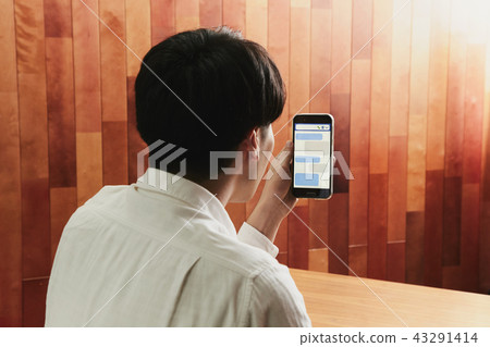 Landscape male message smartphone 43291414