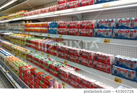 Milk containing prebiotic in bottle at supermarket Milk containing prebiotic in bottle at supermarket 43303726