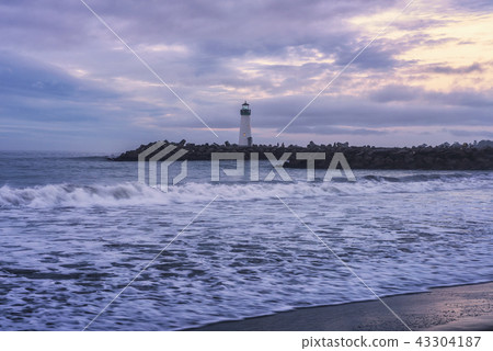 Sunrise above Santa Cruz Breakwater Lighthouse Sunrise above Santa Cruz Breakwater Lighthouse 43304187