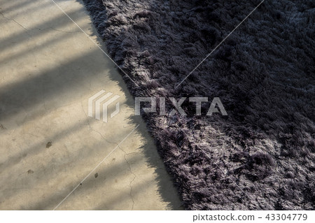 Dark gray soft carpet concrete floor from above. Dark gray soft carpet concrete floor from above. 43304779