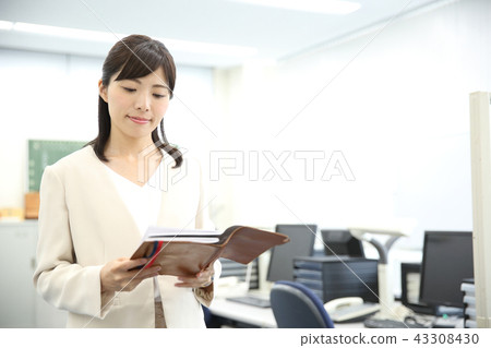a working woman a working woman 43308430