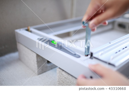 Do-it-yourself (body parts faceless do-it-yourself DIY driver assembling storeroom warehouse house construction) 43310668