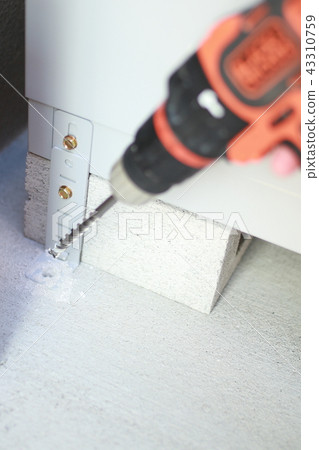 Do-it-yourself (body parts faceless do-it-yourself DIY driver assembling storeroom warehouse house construction) 43310759