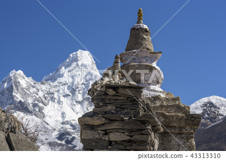 Buddhist stupa and Ama Dablam summit in Khumbu 43313310
