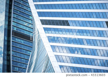 Modern Business Office Building Windows Repeating Pattern, Blue Glass Facade with Geometric Lines Modern Business Office Building Windows Repeating Pattern, Blue Glass Facade with Geometric Lines 43313603