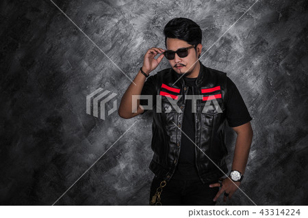 biker man in black leather jacket 43314224
