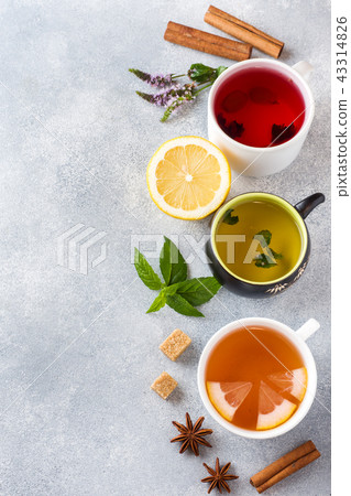 Cups with different tea Red, green and black  43314826