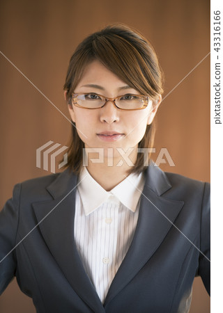 Business woman making a serious look Business woman making a serious look 43316166