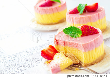 Delicious homemade mango strawberry cheesecake 43318341