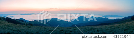 Waves of clouds over the mountains in the morning Waves of clouds over the mountains in the morning 43321944