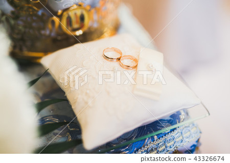 Wedding rings on ceremony at church. Macro. Wedding rings on ceremony at church. Macro. 43326674