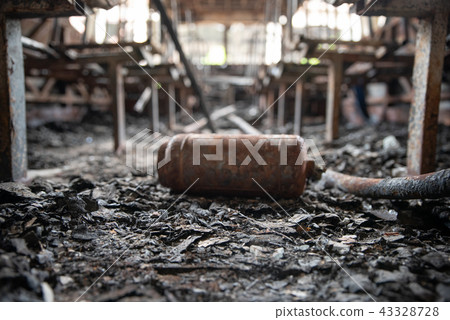 Burned down bus, inside. After a fire. Conception Burned down bus, inside. After a fire. Conception 43328728