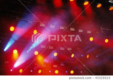 Several red stage lights in the dark Several red stage lights in the dark 43329323