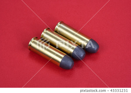 The .45 Revolver cartridges dating to 1872 on red 43331231