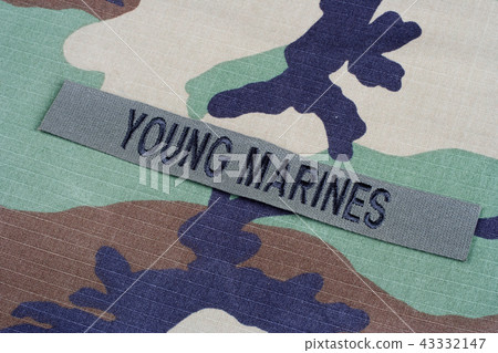 US YOUNG MARINES branch tape on camouflage uniform US YOUNG MARINES branch tape on camouflage uniform 43332147