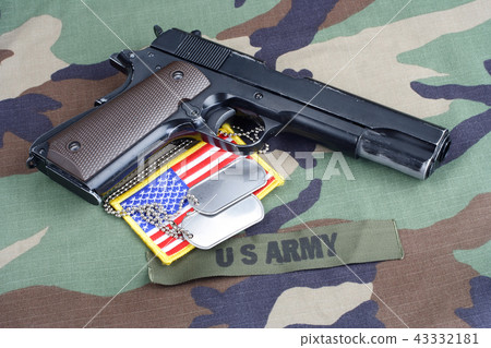 US ARMY branch tape, M1911 handgun with dog tags US ARMY branch tape, M1911 handgun with dog tags 43332181