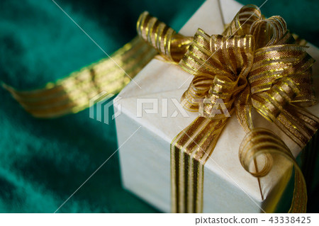 Gold ribbon gift Gold ribbon gift 43338425