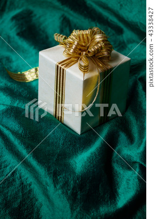 Gold ribbon gift Gold ribbon gift 43338427