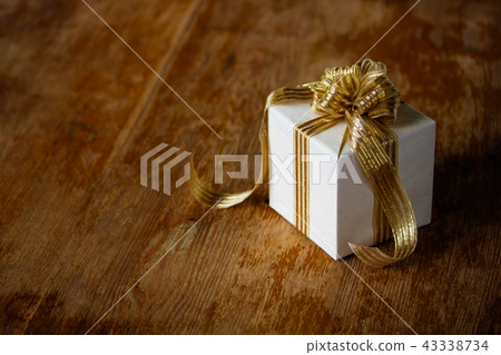 Gold ribbon gift Gold ribbon gift 43338734