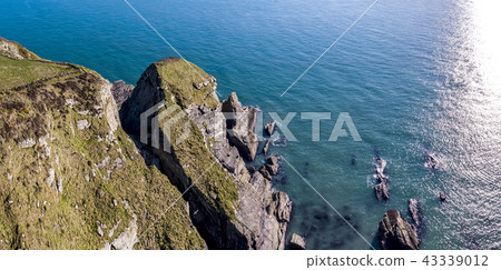 Aerial view of the beautiful cliffs close to the historic South Stack lighthouse on Anglesey - Wales 43339012