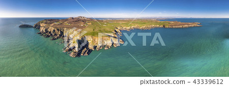 Aerial view of the beautiful cliffs close to the historic South Stack lighthouse on Anglesey - Wales Aerial view of the beautiful cliffs close to the historic South Stack lighthouse on Anglesey - Wales 43339612