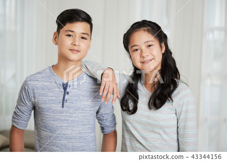 Cheerful siblings 43344156