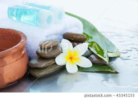 Two bottles with oil for massage. Spa concept Two bottles with oil for massage. Spa concept 43345155