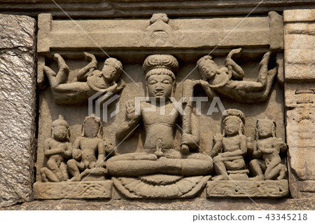 Figures carved on one of the Jageshwar temple Figures carved on one of the Jageshwar temple 43345218