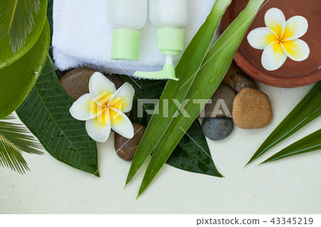 Spa or wellness background with white towels Spa or wellness background with white towels 43345219