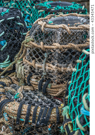 Crab and lobster pots in a port 43345471